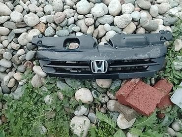 ветровик скутер: Решетка радиатора Honda — 6