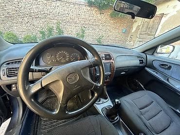 step rf3: Mazda 626: 1999 г., 1.8 л, Механика, Бензин, Седан — 6
