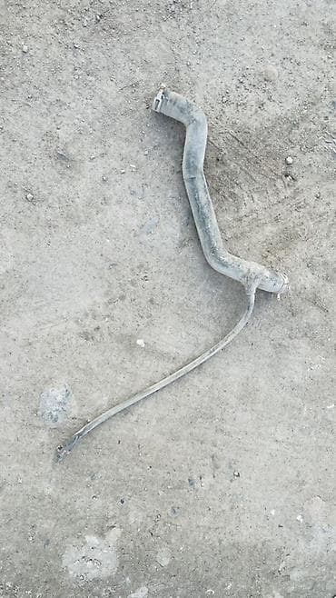 запчасти гольф 5: Патрубок Volkswagen 1987 г., Б/у, Оригинал, Германия — 2