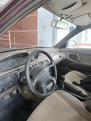 Продажа авто: Mazda 626: 1994 г., 2 л, Механика, Дизель, Седан — 7