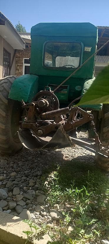 ауман тягач: Трактор с навесным оборудованием - Колесный трактор (кабина с — 2