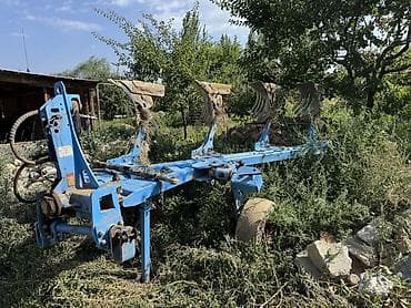 Навесной оборотный плуг, 4-корпусный 4+1. 5 корпусный Захват до 2,20 at lalafo.kg Навесной оборотный плуг, 4-корпусный 4+1. 5 корпусный Захват до 2,20