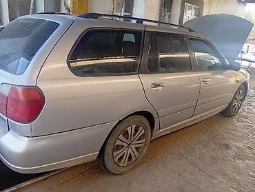 9 r20: Nissan Primera: 2001 г., 1.8 л, Механика, Бензин, Универсал — 5