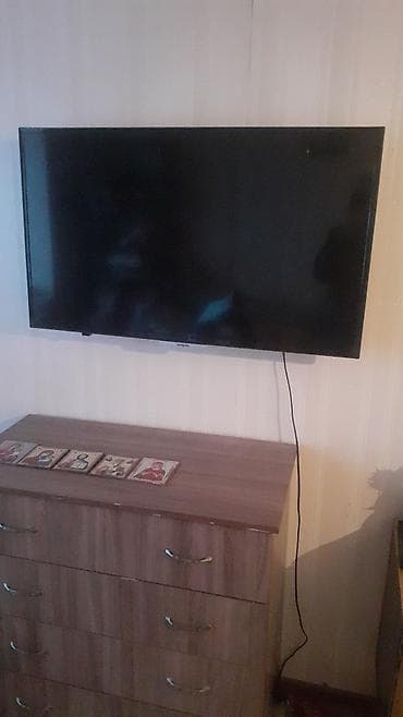 Телевизор VASIN, диагональ примерно 40–43". Плоская LED‑панель с
