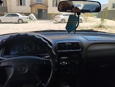 ом 422: Mazda 626: 1998 г., 1.8 л, Механика, Бензин, Седан — 5