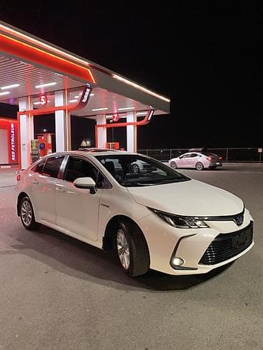 outback br: Toyota Corolla: 2021 г., 1.8 л, Вариатор, Гибрид, Седан — 4