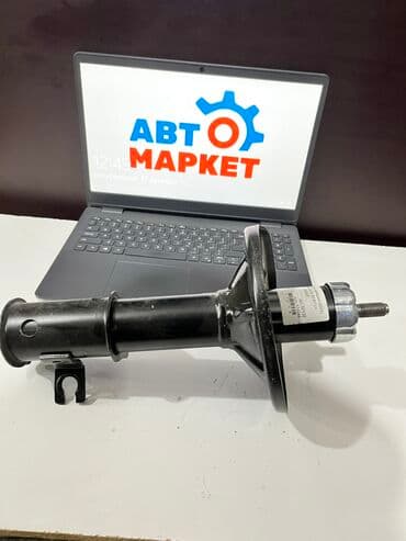 ge: Передний амортизатор Mazda 1997 г., Новый — 1