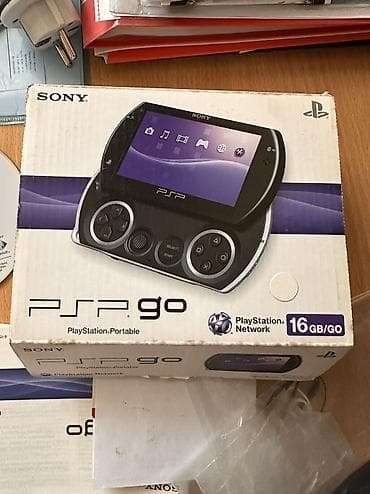 9 с: Портативная игровая приставка Sony PSP Go в компактном корпусе — 4