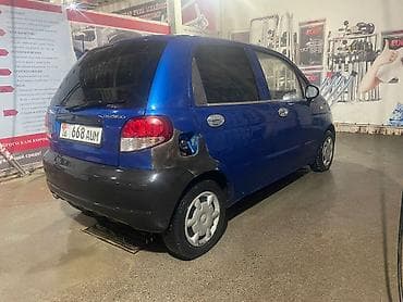 opel astra gtc: Daewoo Matiz: 2009 г., Механика, Бензин — 2