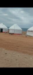 дом у реки: Продаю 2 юрты с металлическим каркасом. Размер: 4×40 Состояние — 2