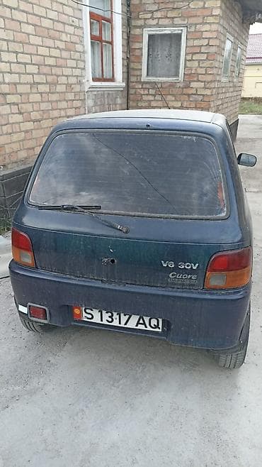 bmw e23: Daihatsu Cuore: 1999 г., Механика, Хэтчбэк — 1