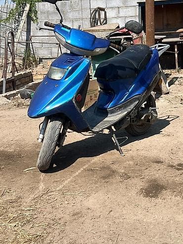 Мототехника: Скутер Yamaha Jog (по приборной панели) в синем цвете. Основные — 2