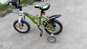 90: Детский велосипед Schwinn, зеленый с белыми и черными акцентами — 4