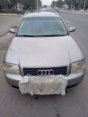 audi 80 ош: Универсал Audi A6 Avant C5 серого цвета, оборудованный рейлингами на — 2