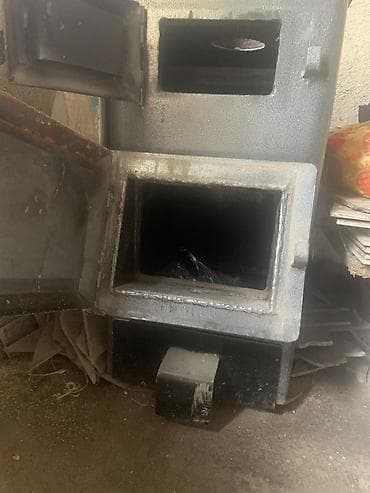 Твердотопливный котёл с водяным контуром - Стальной корпус с