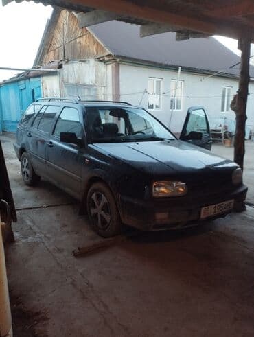 авто зарядное устройство для автомобильного аккумулятора: Volkswagen Golf Variant: 1996 г., 1.8 л, Бензиновая, Универсал — 1