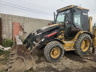 Погрузчик, Caterpillar, Колесный, Ковшовый — 1