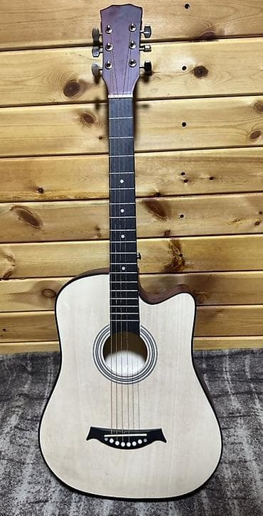 гриф акустической гитары: Акустическая гитара формата дредноут с вырезом (cutaway). - Корпус — 1