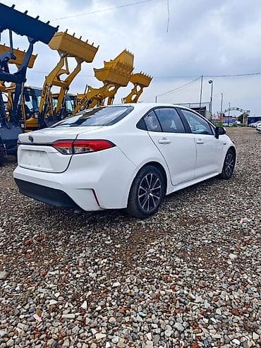 coroll: Toyota Corolla: 2023 г., 1.8 л, Гибрид, Седан — 2