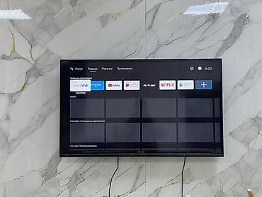 Телевизор SHARP AQUOS с установленной Smart-приставкой (пульт Mi с