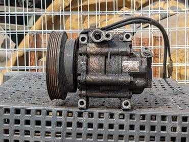 промышленный компрессор: Компрессор Mazda 1996 г., Б/у, Оригинал, Германия — 1