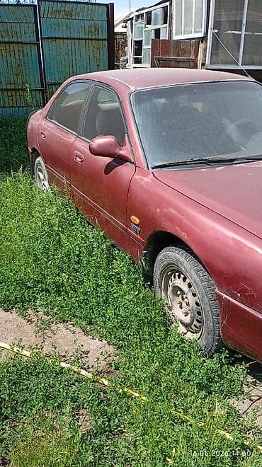 geely galaxy e5: Mazda 626: 1992 г., Механика, Седан — 5