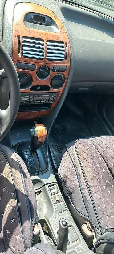 step 2: Mitsubishi Carisma: 1997 г., 1.6 л, Автомат, Бензин, Седан — 6