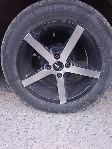 Литые диски R15 с шинами Kumho - Размер шин: 195/60 R15 (надпись на