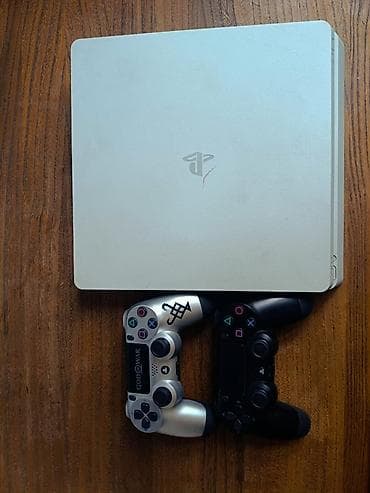 Игровая приставка Sony PlayStation 4 Slim (белая) Комплектация: - — 4