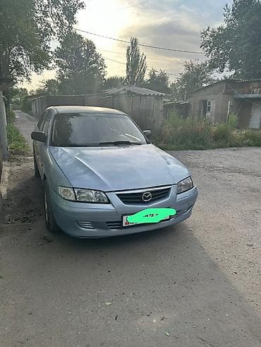 Транспорт: Mazda 626: 2000 г., 2 л, Механика, Бензин, Хэтчбэк — 2