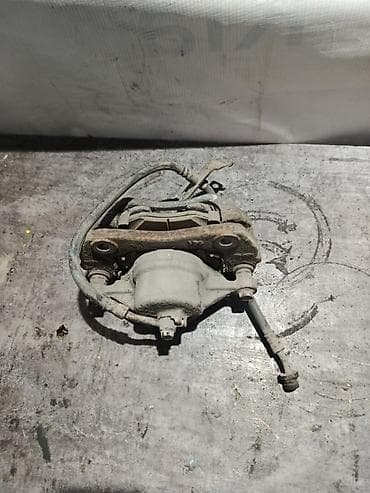 logitech c525: Передний правый суппорт Kia 2013 г., Оригинал — 2