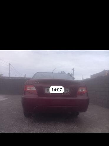 Транспорт: Daewoo Nexia: 2010 г., Седан — 2