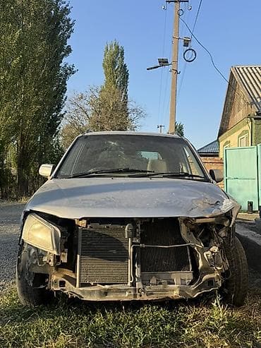 mazda 323 седан: Mazda Demio: 2000 г., 1.3 л, Автомат, Бензин, Минивэн — 1