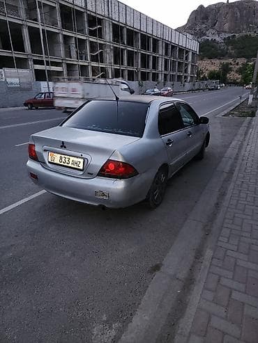jac t9 hunter: Mitsubishi Lancer: 2005 г., Седан — 3