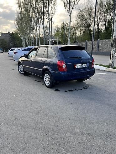 катер ямаха: Mazda Familia: 2003 г., 1.3 л, Ручные, Бензин, Универсал — 4