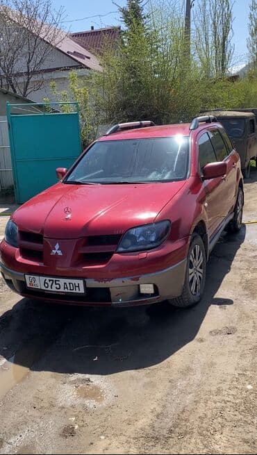 Mitsubishi Outlander: 2004 г., 2 л, Механика, Бензиновая — 1