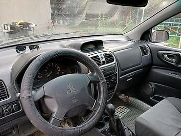 бак на поджеро 2: Mitsubishi Space Star: 2003 г., 1.8 л, Механика, Бензин, Минивэн — 5