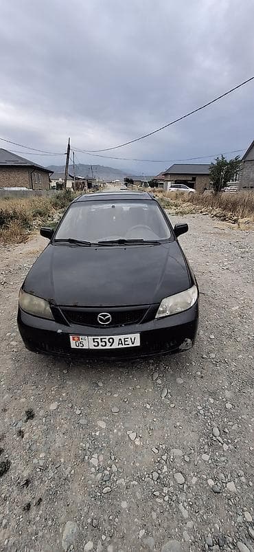 familia: Mazda Familia: 2001 г., Автомат, Бензин, Седан — 1