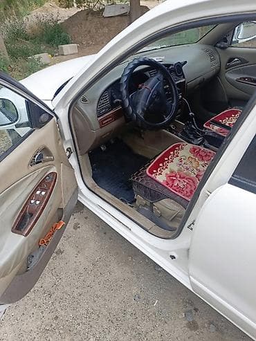 машина некция: Daewoo Nubira: 2000 г., Седан — 6