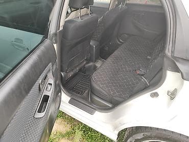 авто выхлоп: Subaru Impreza: 2005 г., 1.5 л, Автомат, Бензин, Универсал — 10
