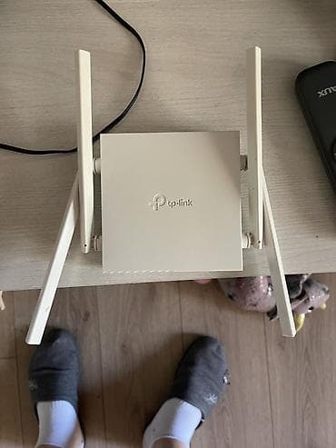 router: TP-Link Archer C24 (AC750) — двухдиапазонный Wi‑Fi роутер Основные — 1