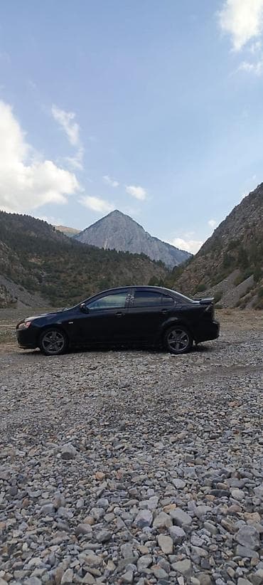 боковой тырмо: Mitsubishi Lancer: 2014 г., Седан — 4