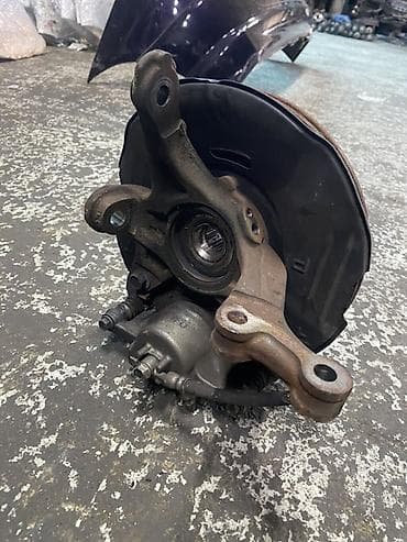 Автозапчасти: Поворотный кулак (суппорт/ступица/диск) в сборе для передней оси Honda — 1