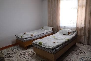 Уютный двухместный номер с раздельными односпальными кроватями at lalafo.kg Уютный двухместный номер с раздельными односпальными кроватями