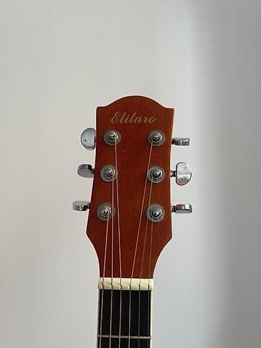 динамики на авто: Акустическая гитара Elitaro с вырезом (cutaway) - Корпус формата — 4