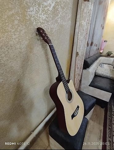 Музыкальные инструменты: Акустическая гитара с вырезом (cutaway), форма корпуса Dreadnought — 7