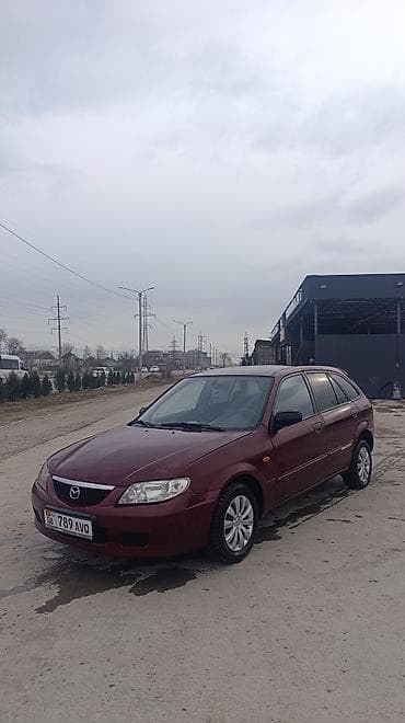 matiz 2009: Mazda 323: 2003 г., 1.3 л, Механика, Бензин, Хэтчбэк — 2