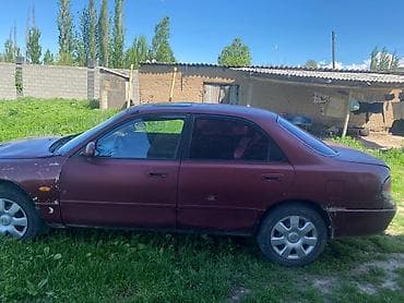 Унаа: Mazda 626: 1995 г., 2 л, Кол менен иштөөчү, Бензин, Седан — 2