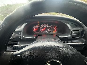 дорогие машины: Mazda Millenia: 1999 г., Седан — 4