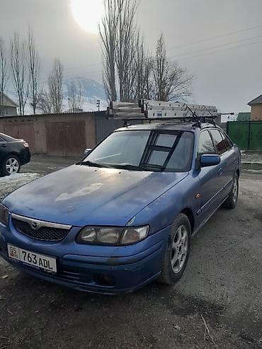 highlander 2012: Mazda 626: 1999 г., 2 л, Ручные, Бензин, Хэтчбэк — 6